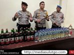 Polres Gorontalo Utara Sita Puluhan Botol Miras dari Tangan Pengecer