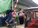 Jumat Berkah, Butik Arfa Kotamobagu Berikan Bantuan ke-Pengendara Bentor