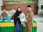 Sebanyak 578 KPM di Kayubulan Mendapat Bantuan Beras Program CPP