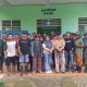Kegiatan TMMD, TNI dan Pemdes Tobongon Bersihkan Lapangan Olahraga