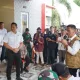 Bupati Bolsel Iskandar Kamaru Saat menyambut Menteri ATR/BPN Agus Harimurti Yudhoyono