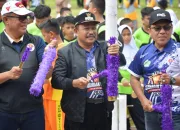 Pembukaan Kejuaraan Olahraga Antar Kampung (TARKAM) Kabupaten Boalemo: Pj. Bupati Resmi Mulai Pertandingan