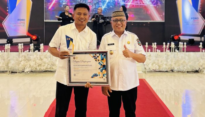 Desa Helumo Raih Penghargaan PDRD Award 2025 Berkat Realisasi Pajak Tercepat